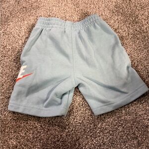 Nike Kids Pale Blue Elastic Waist Athletic Shorts with Orange Swoosh